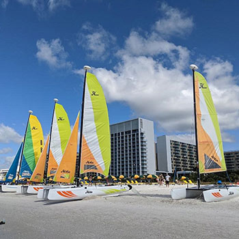 Sailboats on the beach at The Charter Club of Marco Beach® | Association Features Gallery